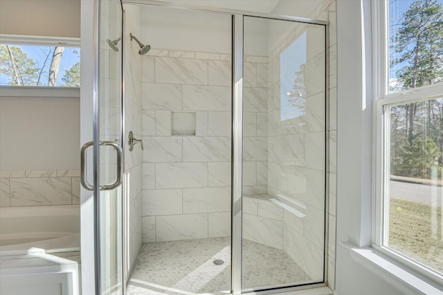 bathroom with an enclosed shower