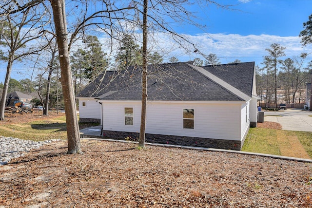 view of side of property featuring cooling unit