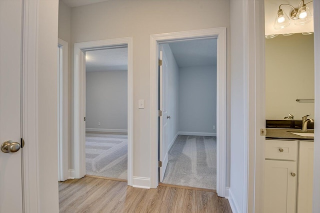 bathroom featuring vanity and hardwood / wood-style floors