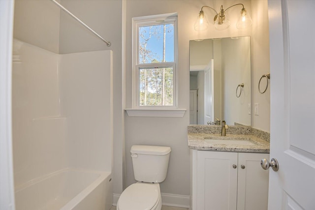 full bathroom with vanity, bathing tub / shower combination, and toilet