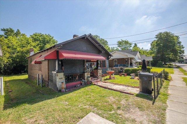 view of front facade with a front yard