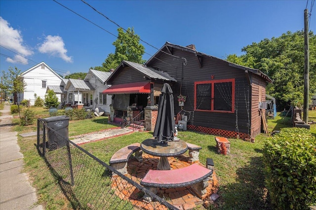 exterior space featuring a front lawn