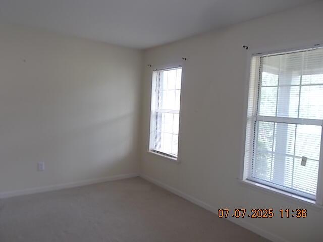 3938 Crest Dr, Hephzibah, GA 30815 - carpeted spare room with baseboards