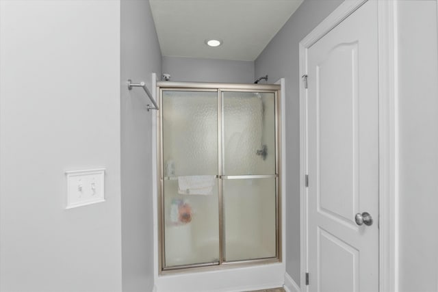 full bath featuring a stall shower