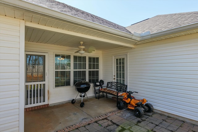 view of patio featuring grilling area and a ceiling fan