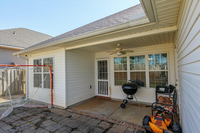 view of patio / terrace with grilling area and ceiling fan