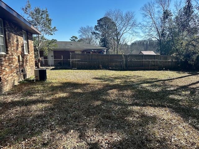 view of yard featuring central AC unit