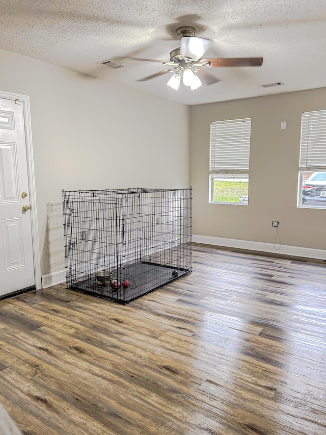 620 W Clinton Way, Martinez, GA 30907 - unfurnished room featuring ceiling fan, wood finished floors, baseboards, and a textured ceiling