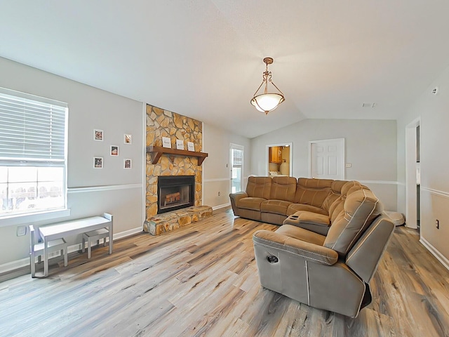 620 W Clinton Way, Martinez, GA 30907 - living area featuring light wood-style floors, a fireplace, lofted ceiling, and baseboards