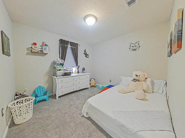 620 W Clinton Way, Martinez, GA 30907 - carpeted bedroom with a textured ceiling