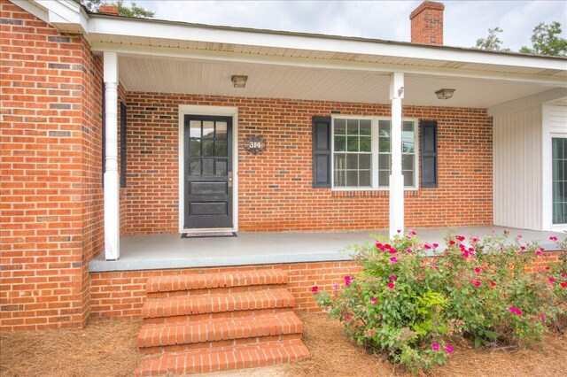 entrance to property with covered porch