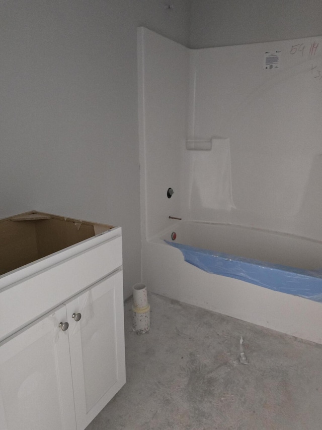 bathroom with vanity and shower / bathing tub combination