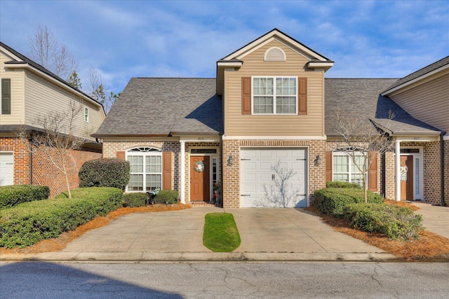 front of property with a garage