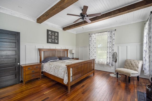 bedroom with beamed ceiling, dark hardwood / wood-style floors, and ceiling fan