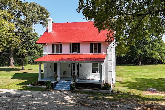 view of front of home featuring a porch and a front lawn