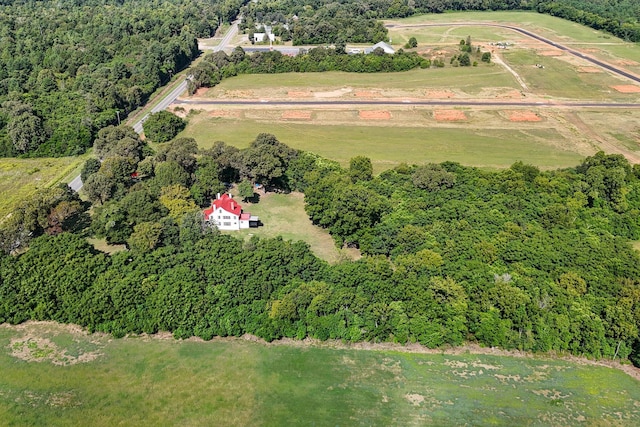 birds eye view of property with a rural view