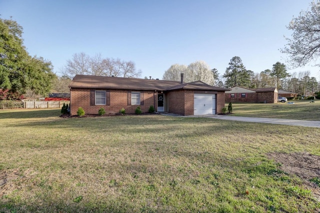 single story home with a front yard, concrete driveway, brick siding, and a garage