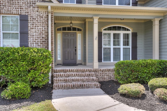 property entrance with a porch