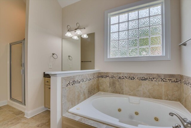 bathroom featuring tile patterned flooring, vanity, and independent shower and bath