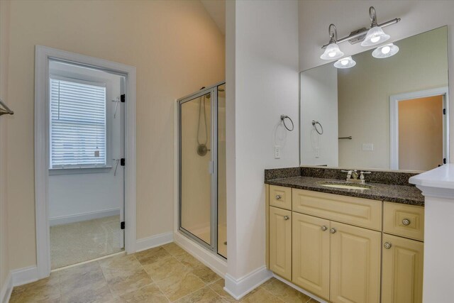 bathroom featuring vanity and walk in shower