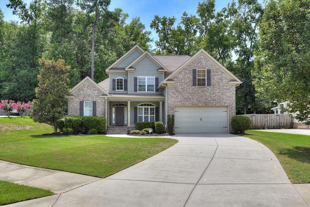 craftsman inspired home with covered porch, a garage, and a front lawn