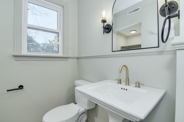 bathroom with sink and toilet