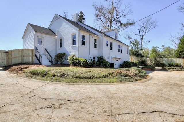 2319 Woodbine Rd, Augusta, GA 30904 - view of property exterior featuring a chimney and brick siding