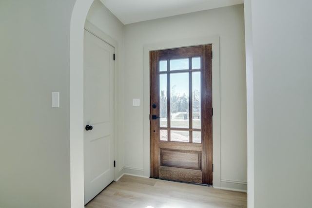 doorway to outside with light hardwood / wood-style flooring