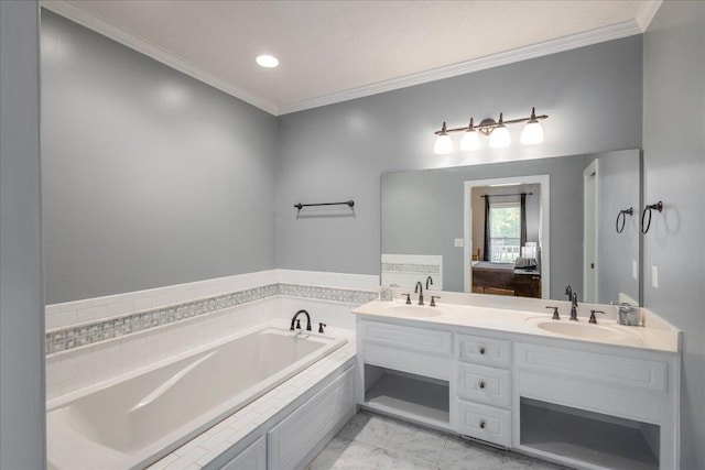 bathroom featuring vanity, a relaxing tiled tub, and ornamental molding