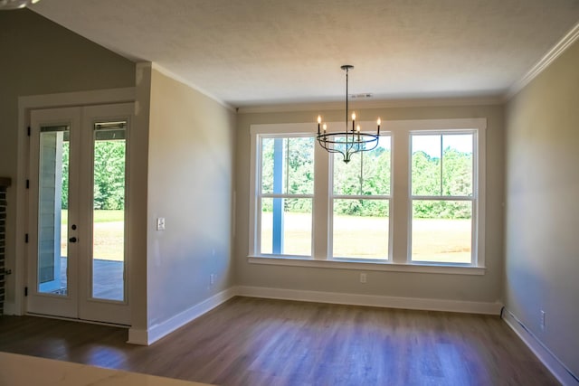 3540 Mistletoe Rd, Appling, GA 30802 - unfurnished dining area with baseboards, ornamental molding, an inviting chandelier, and wood finished floors