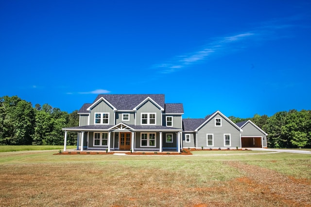 3540 Mistletoe Rd, Appling, GA 30802 - view of front facade featuring concrete driveway, board and batten siding, a porch, and a front yard