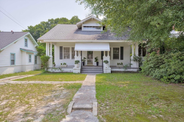 1534 Whitney St, Augusta, GA 30904 - bungalow-style house featuring a front lawn, covered porch, and a shingled roof