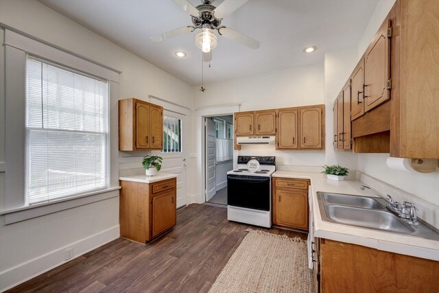 1534 Whitney St, Augusta, GA 30904 - kitchen featuring electric range oven, ventilation hood, a sink, light countertops, and recessed lighting