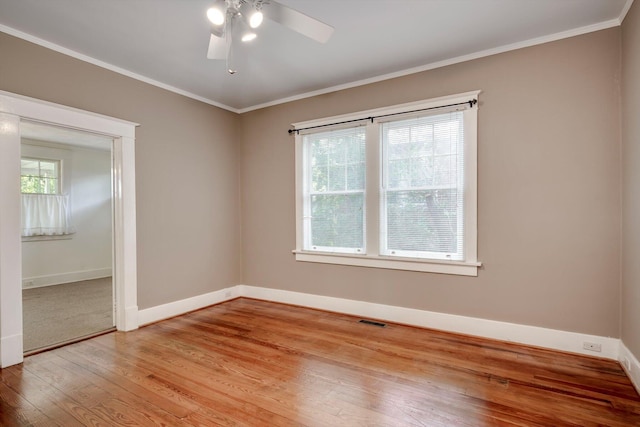 1534 Whitney St, Augusta, GA 30904 - unfurnished room with wood finished floors, baseboards, ceiling fan, and ornamental molding