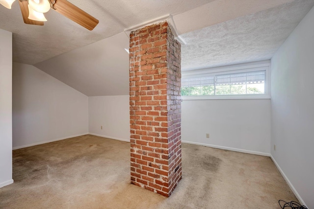 1534 Whitney St, Augusta, GA 30904 - additional living space featuring carpet flooring, a textured ceiling, a ceiling fan, baseboards, and lofted ceiling