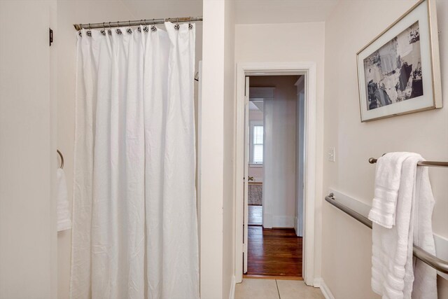 1534 Whitney St, Augusta, GA 30904 - bathroom featuring baseboards, tile patterned flooring, and a shower with curtain