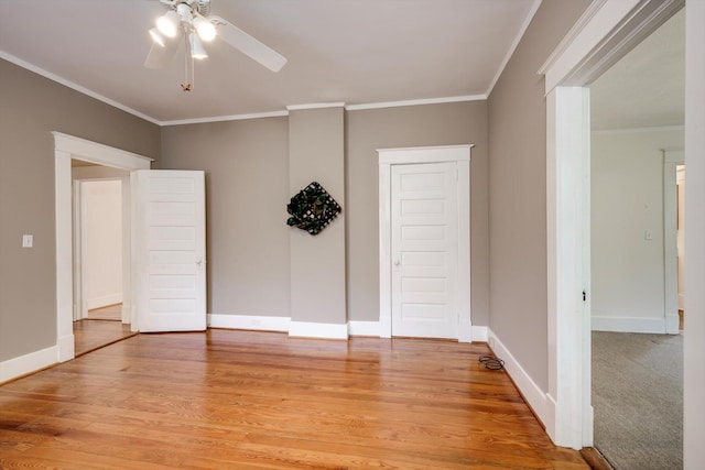 1534 Whitney St, Augusta, GA 30904 - unfurnished room featuring a ceiling fan, light wood-style floors, crown molding, and baseboards