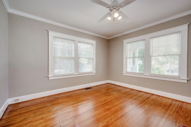 1534 Whitney St, Augusta, GA 30904 - spare room with light wood-style floors, baseboards, crown molding, and a ceiling fan