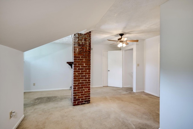 1534 Whitney St, Augusta, GA 30904 - unfurnished living room featuring ceiling fan, carpet floors, lofted ceiling, and baseboards