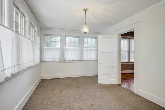 1534 Whitney St, Augusta, GA 30904 - unfurnished room featuring carpet flooring, ornamental molding, baseboards, and a chandelier