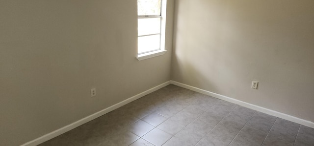 view of tiled spare room