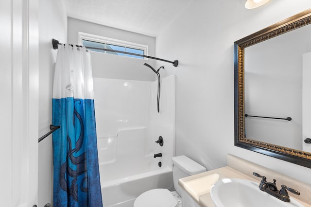 bathroom with toilet, shower / bath combination with curtain, a textured ceiling, and vanity