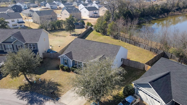 aerial view featuring a water view and a residential view