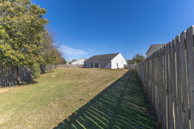 view of yard featuring a fenced backyard