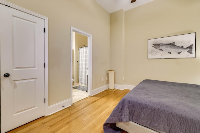 936 Broad St, Augusta, GA 30901 - bedroom featuring light wood-style floors, ensuite bath, and baseboards