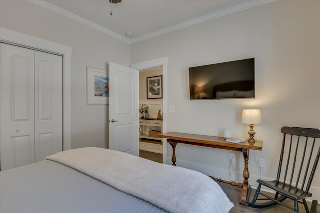 118 Bereau Dr, Mccormick, SC 29835 - bedroom featuring a closet, wood finished floors, baseboards, and ornamental molding