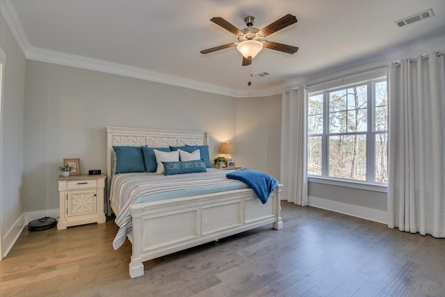 118 Bereau Dr, Mccormick, SC 29835 - bedroom with visible vents, crown molding, and wood finished floors