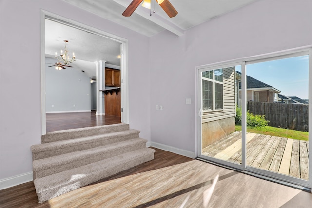 570 Lory Ln, Grovetown, GA 30813 - stairway featuring wood finished floors, a ceiling fan, a chandelier, and beam ceiling