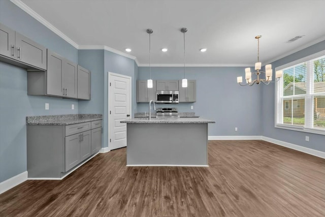 30 Gregg St, Augusta, GA 30901 - kitchen with stainless steel appliances, gray cabinetry, baseboards, and ornamental molding