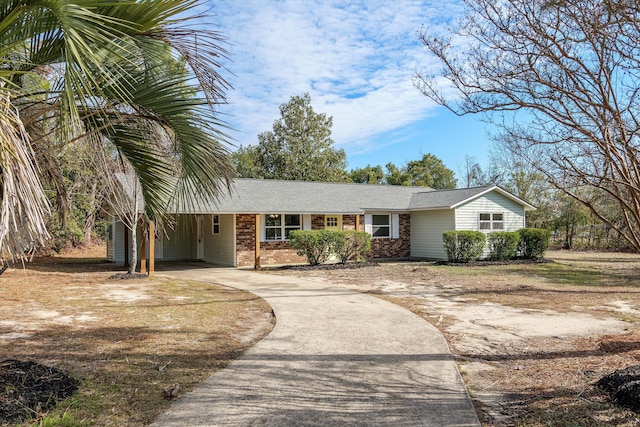 view of front of home with a carport